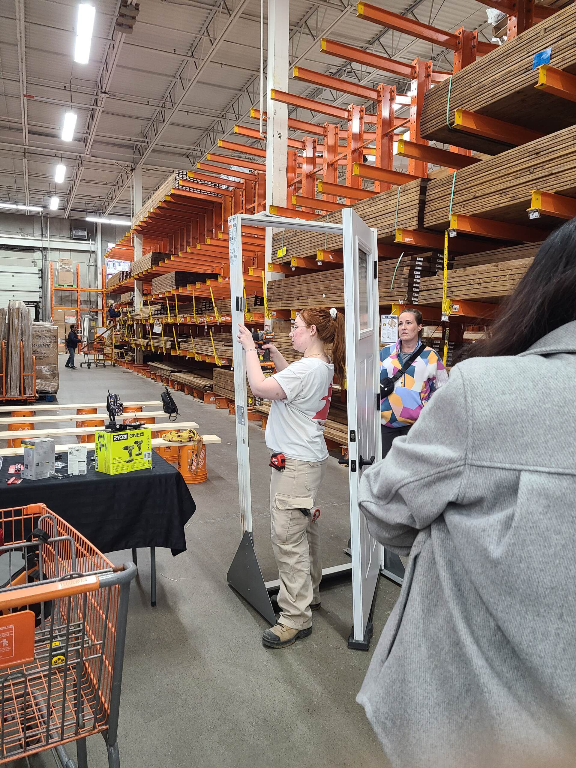 A group of women at home depot learning home renovation